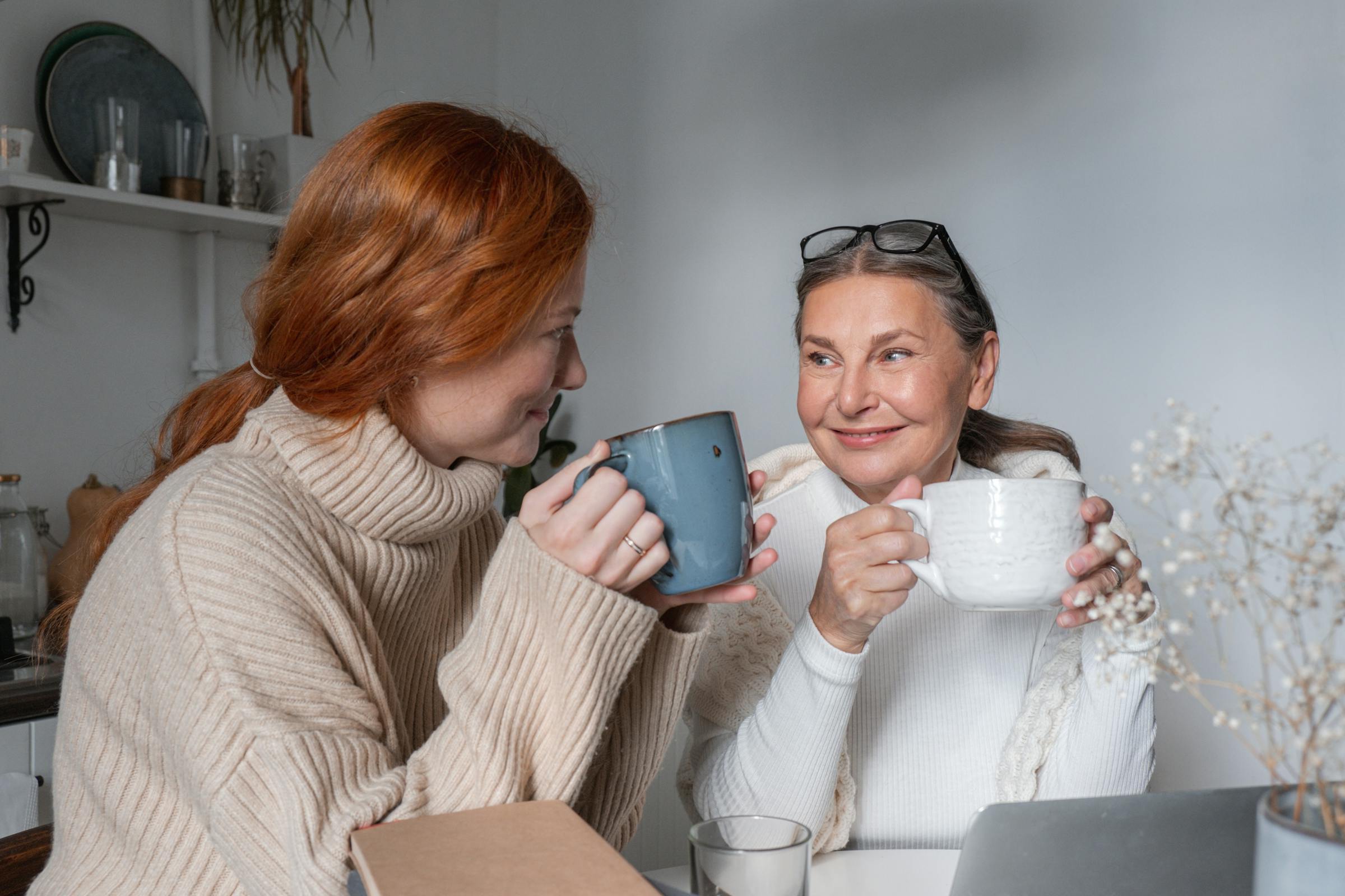 A Barrie host sharing a morning coffee with her Georgian student housemate at the kitchen counter